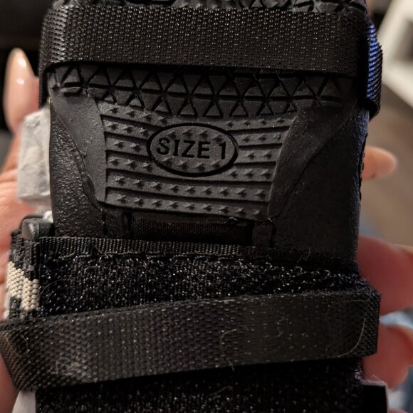 QUMY dog boot with a black upper, yellow paw print, and reflective straps. S - Picture 3 of 5